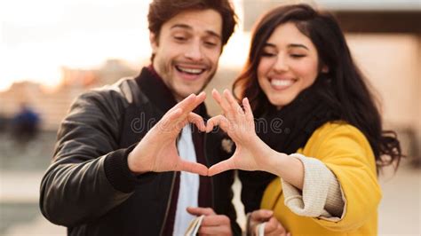 Romantic Couple Making Heart Shape with Hands Stock Image - Image of ...