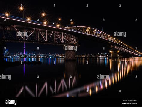 Auckland Harbour Bridge at night including Vector Lights, with Auckland ...