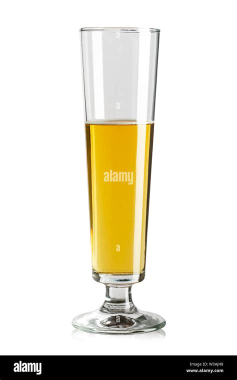 Half a glass of beer on a white background. beer in a traditional high glass goblet. file ...