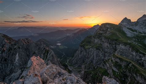 Sunrise in the mountains in Alps | High-Quality Nature Stock Photos ~ Creative Market