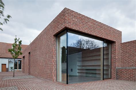 Brick garden with brick house by Jan Proksa Architect; Czech Republic