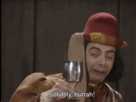 Funny Mr Bean Agree While Holding Wine Glass GIF | GIFDB.com