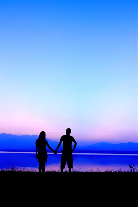 Couple silhouette at sunset 9565263 Stock Photo at Vecteezy