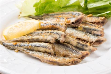 Fried anchovies with salad stock photo. Image of salad - 45818978