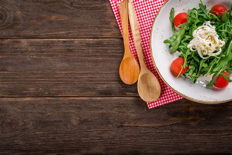 Salad Placed On Wooden Table