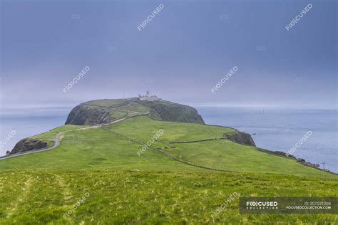 Lighthouse on Sumburgh Head in Shetland, Scotland — water, field ...