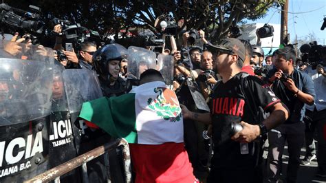 Shouting 'Mexico First,' Hundreds In Tijuana March Against Migrant Caravan : NPR