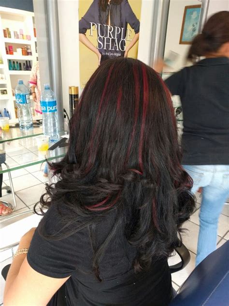 Black hair with red highlights. | Black hair with red highlights, Black red hair, Hair styles