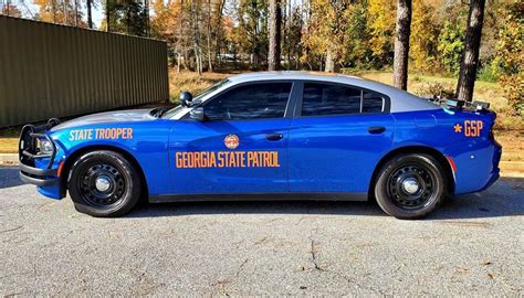 Side view slick top GSP Charger with rear trunk mounted tag readers and that push bumper ...