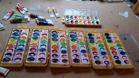 Deb Magelssen Studio: Reuse old watercolor pan paint trays.