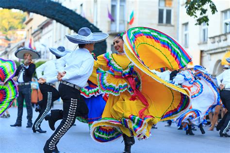 Performers From Mexican Group In Traditional Costumes Dancing On Street ...