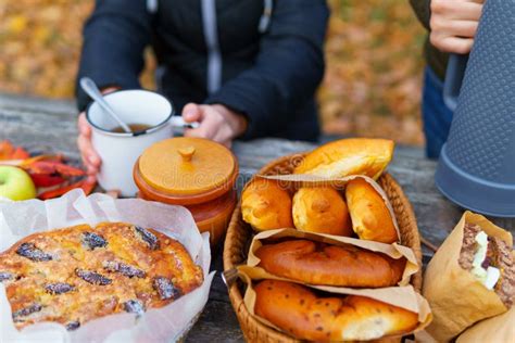 Picnic in the Autumn Season, Food on a Wooden Table, Hot Tea, Pastries ...