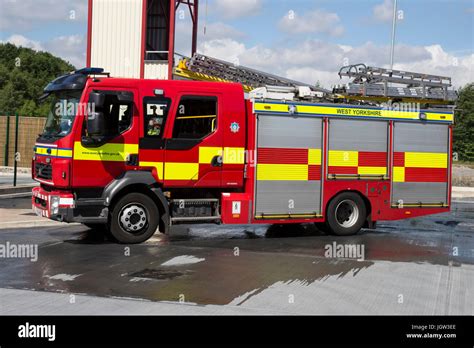 British Fire Engine outside a fire station Stock Photo - Alamy