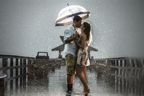 This photographer made the most of the bad weather with this rainy engagement session