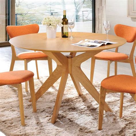 The mid-century Scandinavian design of Aeon's Brockton round dining table is not only ...