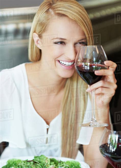 Woman drinking wine - Stock Photo - Dissolve