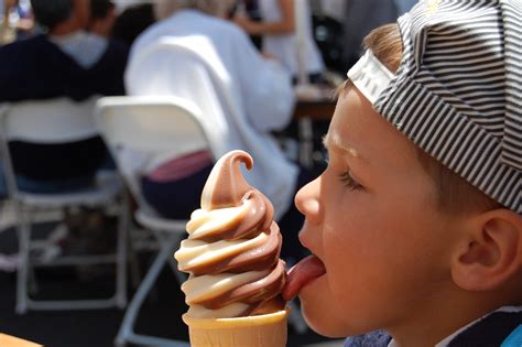 Canva - Kid Licking Ice Cream - Scott Mautz