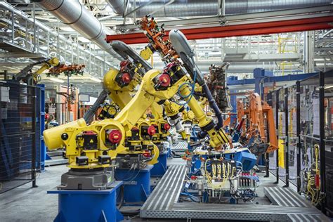 Robots with car parts in car factory - Invest in France