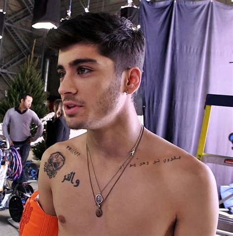 Zayn Malik39s Two Arabic Chest Tattoos Popstartats pertaining to The ...