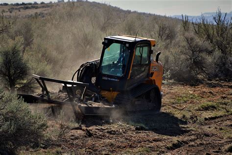 Skid Steer & Brush Cutter - 24-7 Property Maintenance