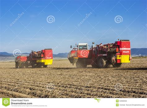 Potato harvesting editorial stock image. Image of engine - 54592594