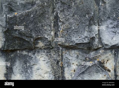 old stone wall as background Stock Photo - Alamy