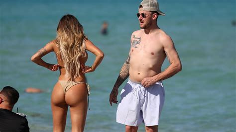 Johnny Manziel Hangs With Bikini Model, Throws Football After Announcing Comeback