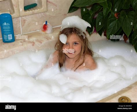 Young Girl In Bubble Bath England Stock Photo: 28962335 - Alamy