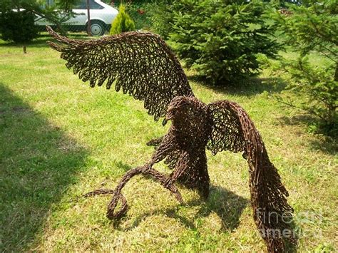 Eagle With Snake Wire Sculpture by Laszlo Komaromi