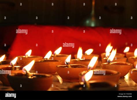 number of oil lamps lit, festival concept Stock Photo - Alamy