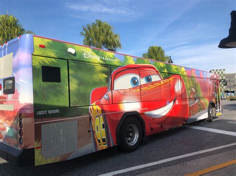 PHOTOS: New "Cars" Lightning McQueen Character Bus Races Into Walt Disney World - WDW News Today