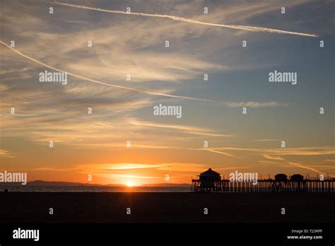 Huntington Beach pier at sunset Stock Photo - Alamy