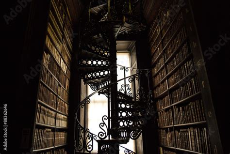 Spiral Staircase in an old Library of Books Stock Photo | Adobe Stock