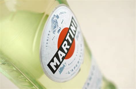 Bottle of Vermouth Martini Rossi close up logo on beige wall background 31235122 Stock Photo at ...