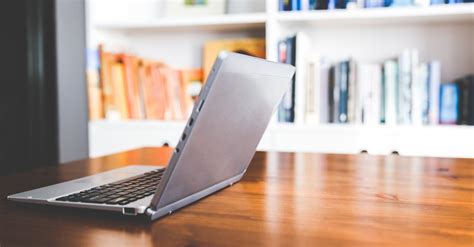 Laptop computer on a wooden desk · Free Stock Photo