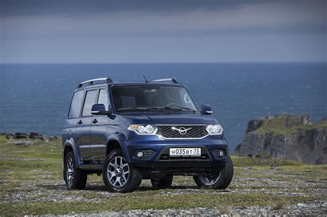 Papeis de parede UAZ Carros russos Patriot, off-road 4x4 Na frente Azul Carros baixar imagens