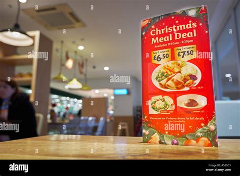 Christmas menu on a table at the Morrisons cafe in Corby, England Stock ...