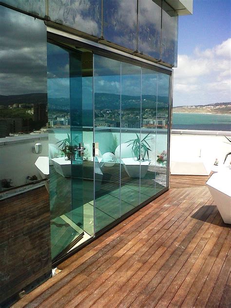 Frameless sliding glass wall is an innovative solution for your home ...