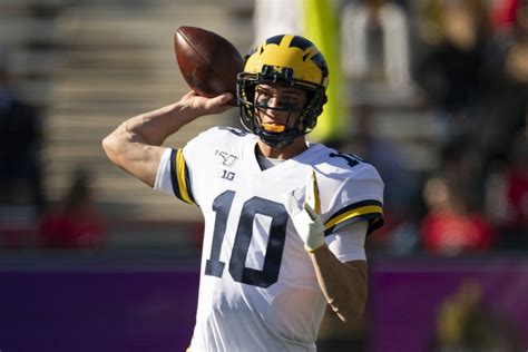 ESPN speaks on Michigan Football’s quarterback development dilemma ...