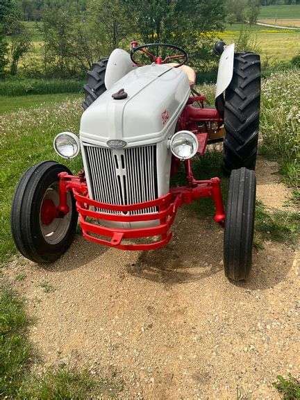 Ford 8N tractor , rebuilt motor ,mower not included , rear tires are ...