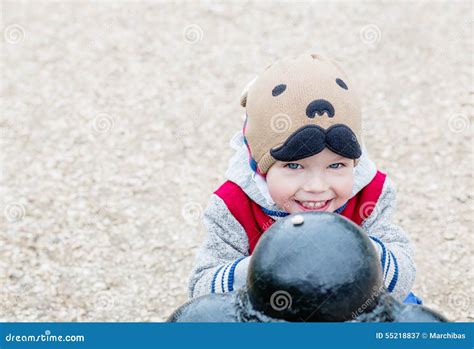 Happy Toddler Boy Playing Outdoors Stock Image - Image of looking, lovely: 55218837