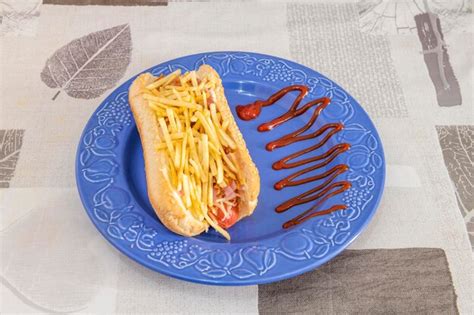 Premium Photo | Brioche bread special hot dog with sausage mustard grated cheese ketchup and ...