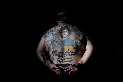 Argentines celebrate 'eternal love' for Maradona with tattoos - Rediff ...