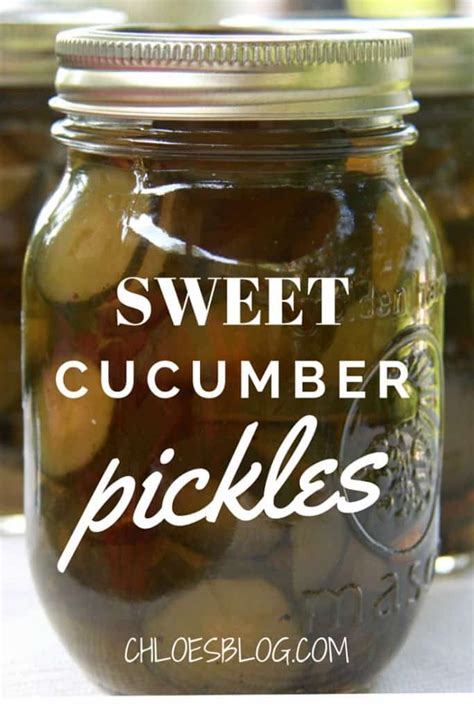 a jar filled with pickles sitting on top of a table