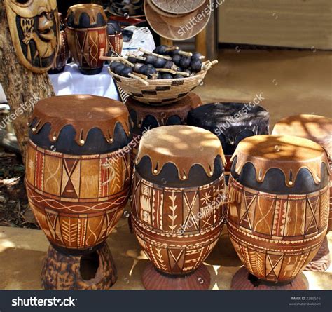 stock-photo-african-bongo-drums-outside-a-market-stall-2389516.jpg ...