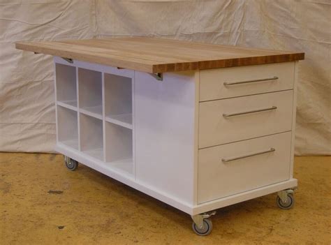 Portable Kitchen Island Table In White Color With Storage Kitchen Island With Table Combi ...