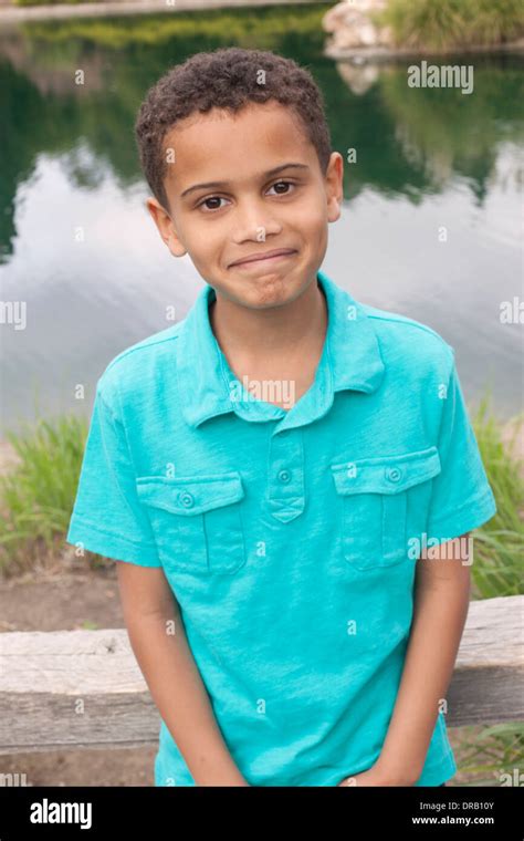 Child looking at reflection in water hi-res stock photography and images - Alamy