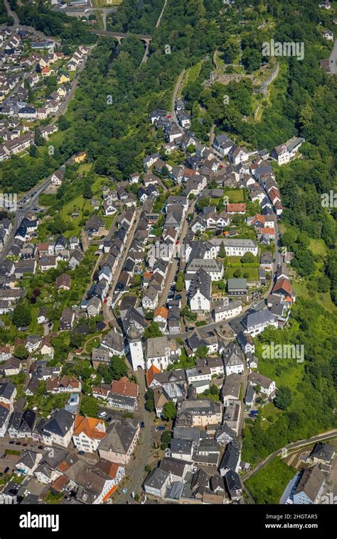 Aerial view, old town with bell tower, castle street and castle ruin ...