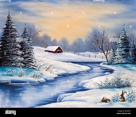 Artwork of snow scene with two rabbits laying by a brook with a cabin ...