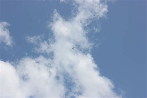 White Clouds Blue Sky Small Plane Free Stock Photo - Public Domain Pictures